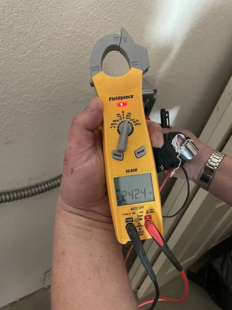 Voltage testing with clamp meter during Generator Installation in Bullskin